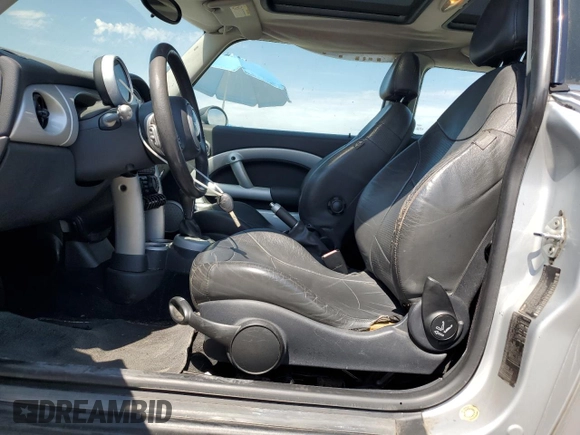 2003 MINI Hardtop with VIN WMWRC33453TE14909, listed as a Copart auction lot 65419725 with 111,960 mi miles and Salvage title. Bid and sale history available at DreamBid. Image 7.