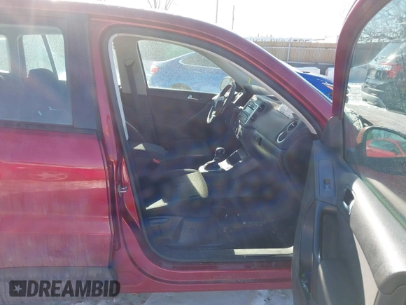 2013 Volkswagen Tiguan S with VIN WVGAV3AX2DW063067, listed as a IAAI auction lot 41638749 with 150,115 mi miles and . Bid and sale history available at DreamBid. Image 5.