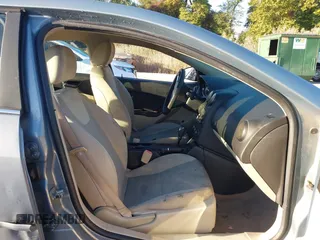 2007 Pontiac G6 with VIN 1G2ZG58N074201257, listed as a IAAI auction lot 40638323 with 227,144 mi miles. Bid and sale history available at carsss.com. Image 5.