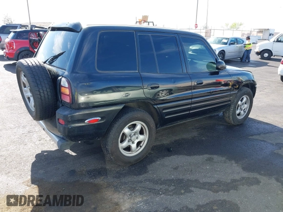 1999 Toyota RAV4 with VIN JT3GP10V9X7058125, listed as a IAAI auction lot 42056633 with 247,015 mi miles and . Bid and sale history available at DreamBid. Image 4.
