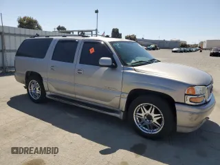 2006 GMC Yukon XL with VIN 1GKFK66U36J134459, listed as a Copart auction lot 55802165 with 277,366 mi miles and Salvage title. Bid and sale history available at DreamBid. Image 4.