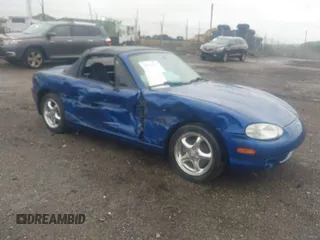 1999 Mazda MX-5 Miata z VIN JM1NB3538X0128467, wystawiony jako IAAI lot #42216027 z przebiegiem 69 302 mil mil oraz . Historia ofert i sprzedaży dostępna na DreamBid. Obrazek 1.