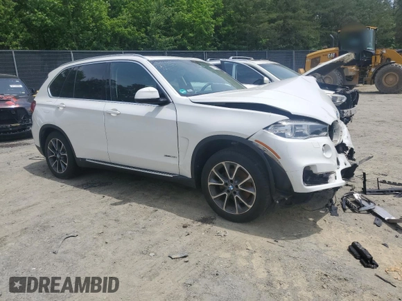 2015 BMW X5 xDrive35i z VIN 5UXKR0C53F0K61488, wystawiony jako Copart lot #57421645 z przebiegiem Nie podano mil oraz Szkoda całkowita • Salvage title. Historia ofert i sprzedaży dostępna na DreamBid. Obrazek 4.