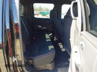 2024 Nissan Frontier Pro-4X with VIN 1N6ED1EK3RN654112, listed as a IAAI auction lot 41686345 with 14,893 mi miles and . Bid and sale history available at DreamBid. Image 8.