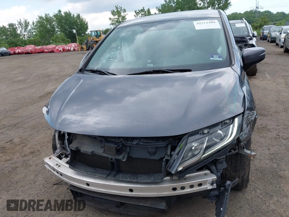 2020 Honda Odyssey EX with VIN 5FNRL6H54LB025555, listed as a IAAI auction lot 42512480 with 95,425 mi miles and . Bid and sale history available at DreamBid. Image 6.