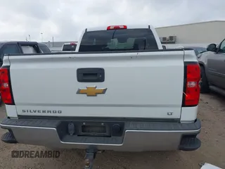 2018 Chevrolet Silverado 1500 LT with VIN 2GCRCREC6J1110773, listed as a IAAI auction lot 42174596 with 136,477 mi miles and . Bid and sale history available at DreamBid. Image 16.