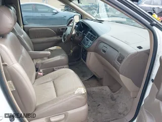 1998 Toyota Sienna LE with VIN 4T3ZF13C9WU088651, listed as a IAAI auction lot 41820184 with 172,808 mi miles. Bid and sale history available at carsss.com. Image 5.