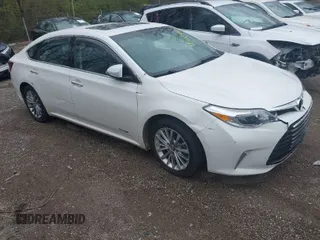 2016 Toyota Avalon Hybrid XLE Premium with VIN 4T1BD1EB3GU050127, listed as a IAAI auction lot 42004607 with 221,708 mi miles. Bid and sale history available at carsss.com. Image 1.