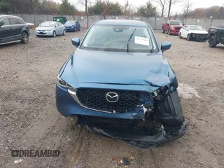 2023 Mazda CX-5 S Carbon Edition z VIN JM3KFBCM4P0264891, wystawiony jako IAAI lot #40933700 z przebiegiem 18 714 mil mil oraz . Historia ofert i sprzedaży dostępna na DreamBid. Obrazek 12.
