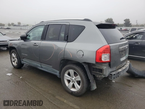 2011 Jeep Compass Latitude with VIN 1J4NT1FB6BD248643, listed as a Copart auction lot 86403584 with 179,795 mi miles and Salvage Title. Bid and sale history available at carsss.com. Image 2.