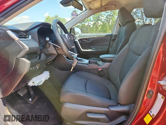 2019 Toyota RAV4 LE with VIN JTMH1RFV0KD517317, listed as a Copart auction lot 60217455 with 57,860 mi miles and Salvage title. Bid and sale history available at DreamBid. Image 7.