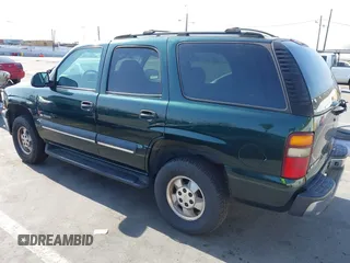 2002 Chevrolet Tahoe LS with VIN 1GNEC13V12R166916, listed as a IAAI auction lot 42393123 with 228,687 mi miles and . Bid and sale history available at DreamBid. Image 3.