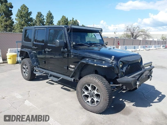 2008 Jeep Wrangler Unlimited Sahara with VIN 1J8GA59168L587554, listed as a IAAI auction lot 41963587 with 189,943 mi miles and . Bid and sale history available at DreamBid. Image 1.
