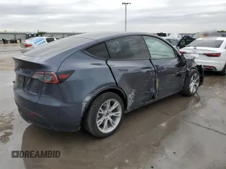 2023 Tesla Model Y Long Range with VIN 7SAYGDEE3PA151887, listed as a Copart auction lot 51459495 with 15,562 mi miles and Salvage Title. Bid and sale history available at DreamBid. Image 3.