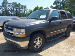 2004 Chevrolet Tahoe LS z VIN 1GNEC13V74R295259, wystawiony jako IAAI lot #42339839 z przebiegiem 264 778 mil mil oraz . Historia ofert i sprzedaży dostępna na DreamBid. Obrazek 2.