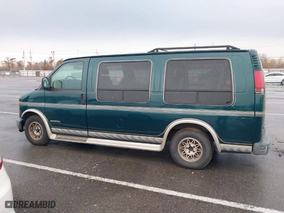 1997 GMC Savana Passenger with VIN 1GDFG15R6V1004277, listed as a IAAI auction lot 41462401 with NaN miles. Bid and sale history available at carsss.com. Image 14.