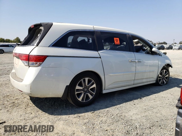2015 Honda Odyssey Touring Elite z VIN 5FNRL5H90FB033511, wystawiony jako Copart lot #67718683 z przebiegiem Nie podano mil oraz Szkoda całkowita • Salvage title. Historia ofert i sprzedaży dostępna na DreamBid. Obrazek 3.