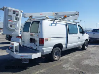 2011 Ford Econoline Cargo Commercial with VIN 1FTSE3EL6BDB29886, listed as a IAAI auction lot 41958479 with 211,787 mi miles. Bid and sale history available at carsss.com. Image 4.