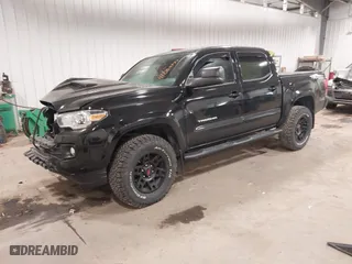 2016 Toyota Tacoma SR with VIN 3TMCZ5AN5GM027471, listed as a IAAI auction lot 41054774 with 74,864 mi miles. Bid and sale history available at carsss.com. Image 17.