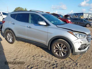 2018 Hyundai Santa Fe 2.0T z VIN 5XYZU4LA1JG516466, wystawiony jako IAAI lot #42265607 z przebiegiem 110 655 mil mil oraz . Historia ofert i sprzedaży dostępna na DreamBid. Obrazek 1.
