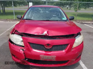 2009 Toyota Corolla z VIN JTDBL40E299070028, wystawiony jako IAAI lot #42684280 z przebiegiem 126 456 mil mil oraz . Historia ofert i sprzedaży dostępna na DreamBid. Obrazek 6.