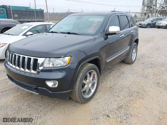 2013 Jeep Grand Cherokee Limited with VIN 1C4RJFBG1DC618482, listed as a IAAI auction lot 40707340 with 108,102 mi miles. Bid and sale history available at carsss.com. Image 2.
