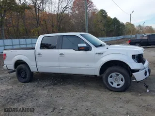 2013 Ford F-150 XL with VIN 1FTFW1ET7DFD22929, listed as a IAAI auction lot 40937321 with 202,995 mi miles. Bid and sale history available at carsss.com. Image 13.
