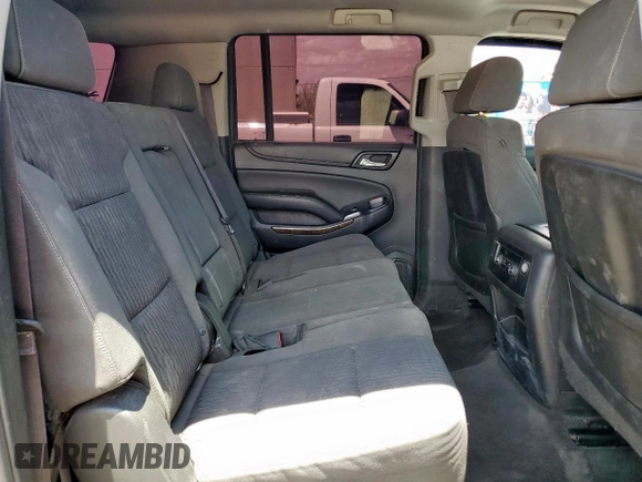 2015 Chevrolet Suburban LS z VIN 1GNSCHKC2FR707277, wystawiony jako Copart lot #59541635 z przebiegiem 198 876 mil mil oraz Szkoda całkowita • Salvage title. Historia ofert i sprzedaży dostępna na DreamBid. Obrazek 11.