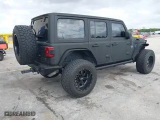 2018 Jeep Wrangler Unlimited Sport S with VIN 1C4HJXDG2JW228483, listed as a IAAI auction lot 41710364 with 56,970 mi miles. Bid and sale history available at carsss.com. Image 4.