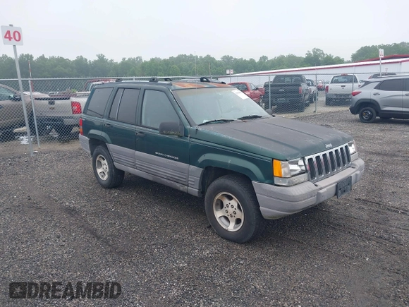 1996 Jeep Grand Cherokee Laredo with VIN 1J4GZ58S6TC333856, listed as a IAAI auction lot 42504895 with 176,955 mi miles and . Bid and sale history available at DreamBid. Image 1.