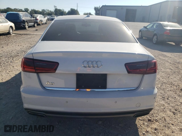 2016 Audi A6 2.0T Premium Plus with VIN WAUDFAFC1GN033686, listed as a Copart auction lot 74600634 with 142,751 mi miles and Salvage Title. Bid and sale history available at carsss.com. Image 6.