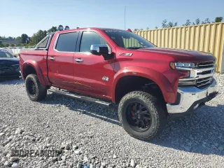 2020 Chevrolet Silverado 1500 LTZ with VIN 1GCUYGEL6LZ104384, listed as a Copart auction lot 74450304 with 76,305 mi miles and Salvage Title. Bid and sale history available at DreamBid. Image 4.