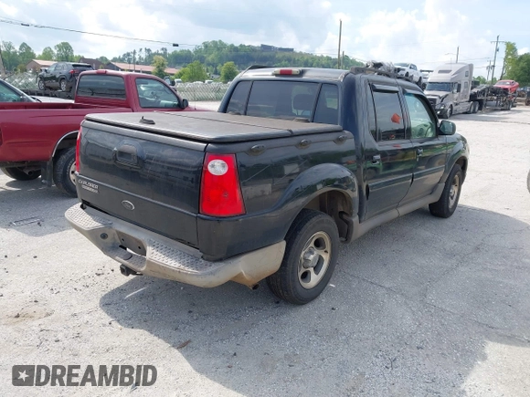 2005 Ford Explorer Sport Trac XLS with VIN 1FMZU67K15UA48446, listed as a IAAI auction lot 42145064 with 220,650 mi miles and . Bid and sale history available at DreamBid. Image 4.