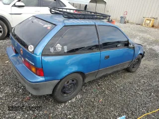 1990 Geo Metro z VIN 2C1MR2465L6014681, wystawiony jako Copart lot #82309254 z przebiegiem 95 146 mil mil oraz Szkody całkowita. Historia ofert i sprzedaży dostępna na DreamBid. Obrazek 3.