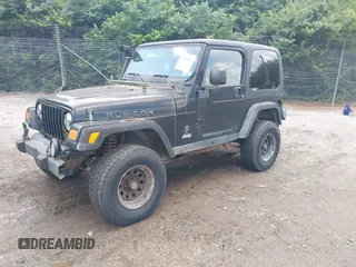 2004 Jeep Wrangler Sport z VIN 1J4FA49S94P792689, wystawiony jako IAAI lot #42394196 z przebiegiem Nie podano mil oraz . Historia ofert i sprzedaży dostępna na DreamBid. Obrazek 2.