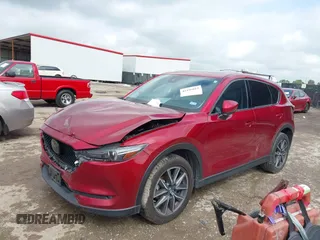2018 Mazda CX-5 Grand Touring with VIN JM3KFADM7J1357401, listed as a IAAI auction lot 42106012 with 119,420 mi miles and . Bid and sale history available at DreamBid. Image 2.