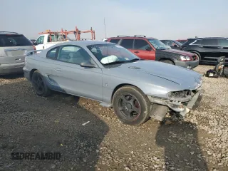 1994 Ford Mustang with VIN 1FALP4046RF182709, listed as a Copart auction lot 83690394 with 236,274 mi miles and Salvage Title. Bid and sale history available at carsss.com. Image 4.