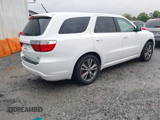 2013 Dodge Durango R/T with VIN 1C4SDHCT6DC672487, listed as a IAAI auction lot 42242172 with 185,074 mi miles and . Bid and sale history available at DreamBid. Image 4.