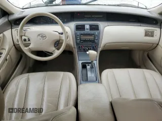 2003 Toyota Avalon XL z VIN 4T1BF28BX3U321934, wystawiony jako Copart lot #59497525 z przebiegiem 107 405 mil mil oraz Szkoda całkowita • Salvage title. Historia ofert i sprzedaży dostępna na DreamBid. Obrazek 8.