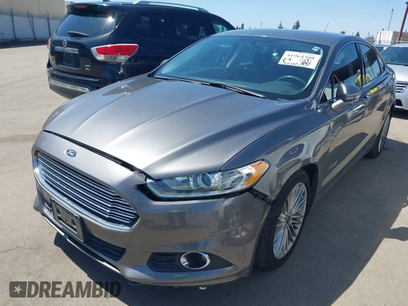 2014 Ford Fusion SE Hybrid with VIN 3FA6P0LU9ER142204, listed as a IAAI auction lot 41964308 with 177,499 mi miles. Bid and sale history available at carsss.com. Image 2.