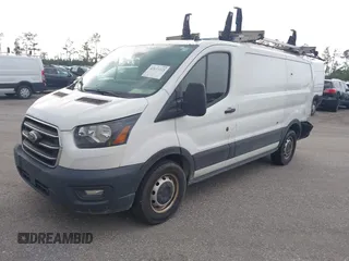 2020 Ford Transit Cargo with VIN 1FTBR1Y8XLKA19646, listed as a IAAI auction lot 42633323 with 82,577 mi miles and . Bid and sale history available at DreamBid. Image 2.