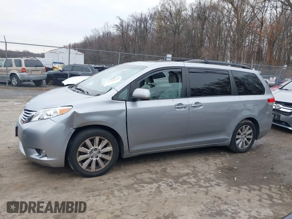 2012 Toyota Sienna XLE with VIN 5TDDK3DC7CS037579, listed as a IAAI auction lot 41080620 with 158,843 mi miles. Bid and sale history available at carsss.com. Image 15.