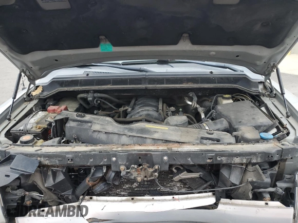 2011 Nissan Titan S z VIN 1N6AA0CJ7BN322207, wystawiony jako Copart lot #77558164 z przebiegiem 177 105 mil mil oraz Szkoda całkowita • Salvage title. Historia ofert i sprzedaży dostępna na DreamBid. Obrazek 13.