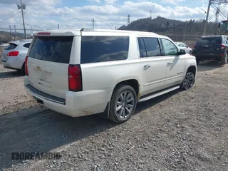 2015 Chevrolet Suburban LTZ with VIN 1GNSKKKC4FR304532, listed as a IAAI auction lot 41899860 with 123,624 mi miles. Bid and sale history available at carsss.com. Image 4.