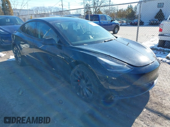 2021 Tesla Model 3 Performance with VIN 5YJ3E1EC5MF090518, listed as a IAAI auction lot 38775658 with 14,118 mi miles and . Bid and sale history available at carsss.com. Image 1.