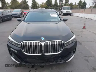 2022 BMW 7 Series 740i with VIN WBA7T2C0XNCJ31291, listed as a IAAI auction lot 40623307 with 98,877 mi miles. Bid and sale history available at carsss.com. Image 12.