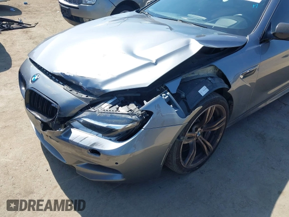 2013 BMW M6 with VIN WBSLX9C51DC968593, listed as a IAAI auction lot 42465979 with 88,010 mi miles and . Bid and sale history available at DreamBid. Image 6.