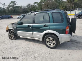 2000 Suzuki Grand Vitara JLX with VIN JS3TD62V5Y4113946, listed as a Copart auction lot 49154945 with 0 mi miles and Non Repairable. Bid and sale history available at carsss.com. Image 2.