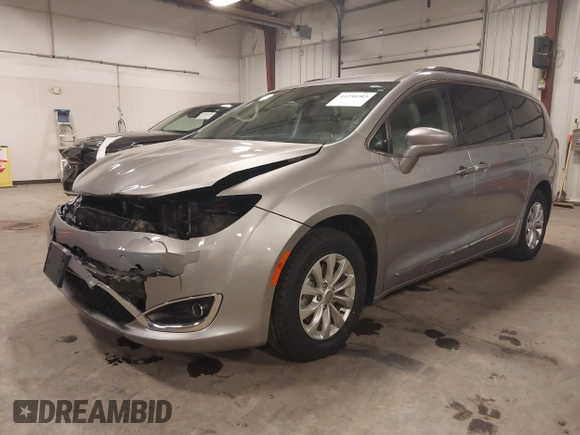 2018 Chrysler Pacifica Touring L with VIN 2C4RC1BG3JR330401, listed as a IAAI auction lot 41250303 with 86,975 mi miles and . Bid and sale history available at DreamBid. Image 20.