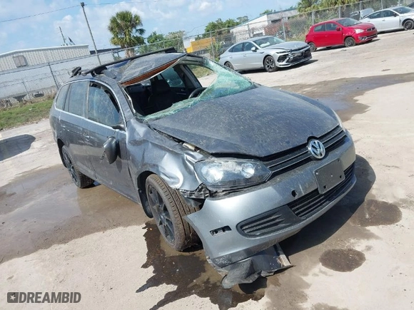 2014 Volkswagen Jetta SportWagen TDI w/Sunroof & Nav with VIN 3VWPL7AJ2EM602051, listed as a IAAI auction lot 41553277 with 114,981 mi miles. Bid and sale history available at carsss.com. Image 6.